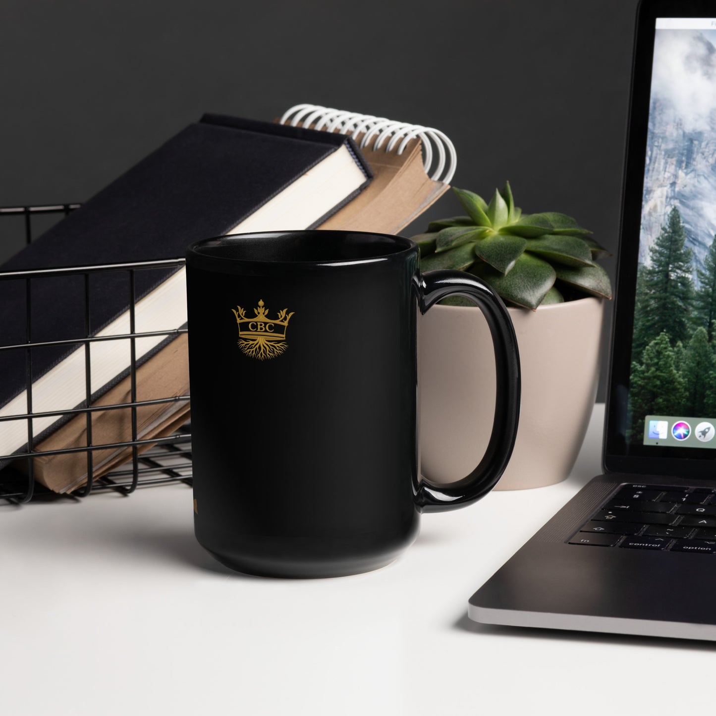 CBC mug with cultural illustration of a royal crowning scene on a glossy ceramic surface.