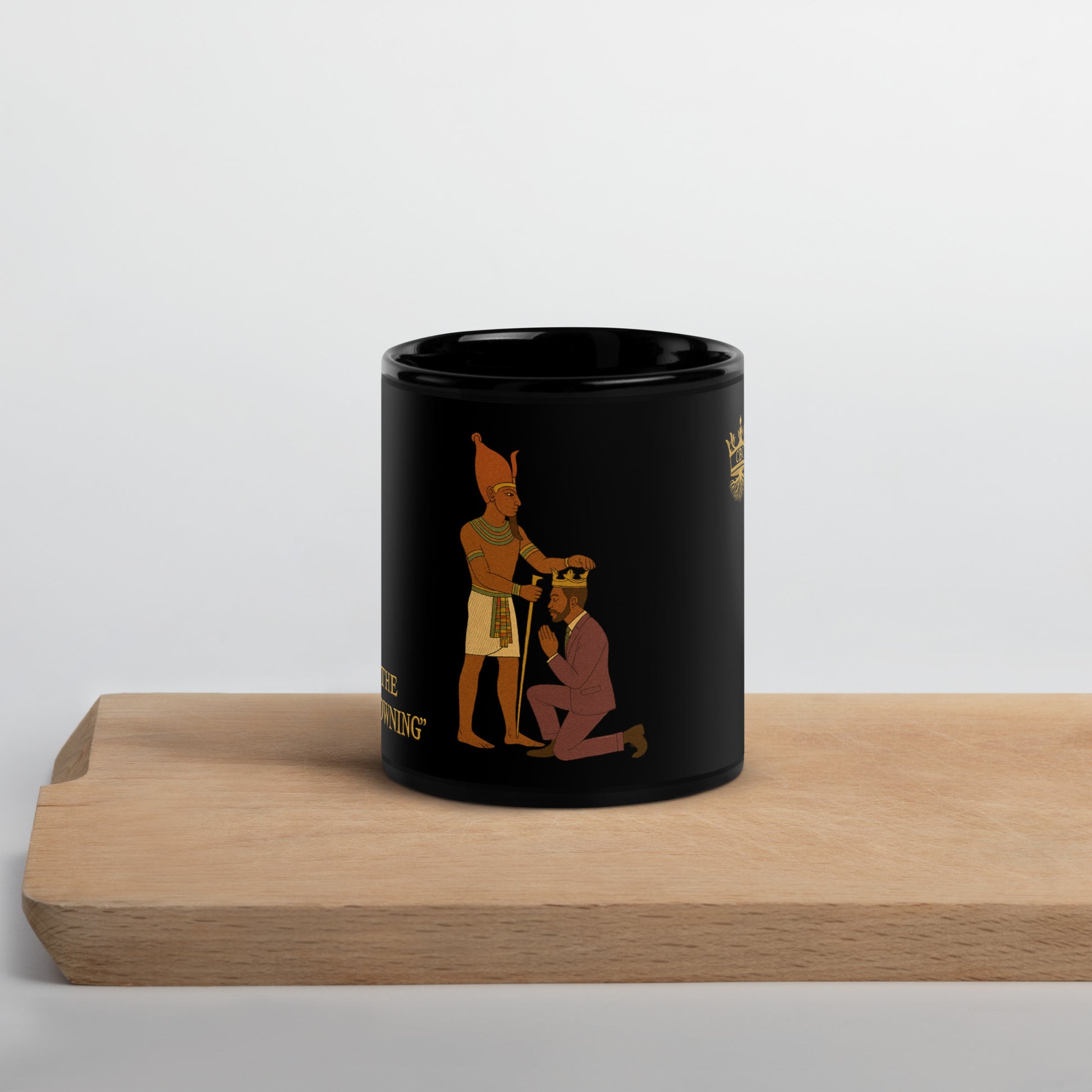 CBC mug with cultural illustration of a royal crowning scene on a glossy ceramic surface.