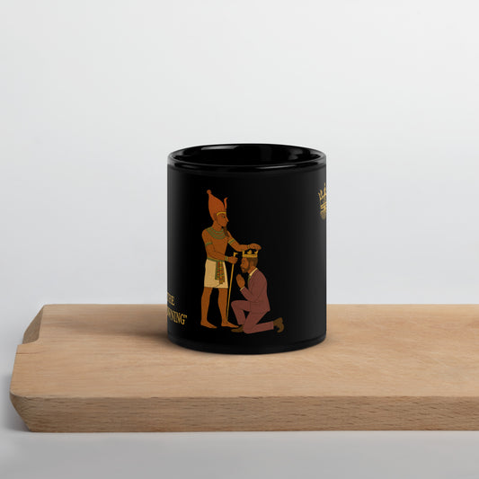 CBC mug with cultural illustration of a royal crowning scene on a glossy ceramic surface.