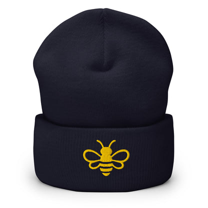 MHA Signature Beanie featuring the embroidered Melanin & Honey bee logo in a premium lifestyle setting.