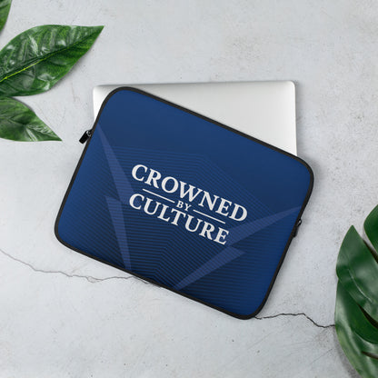 CBC laptop sleeve with geometric line pattern and Crowned By Culture text centered on the front.