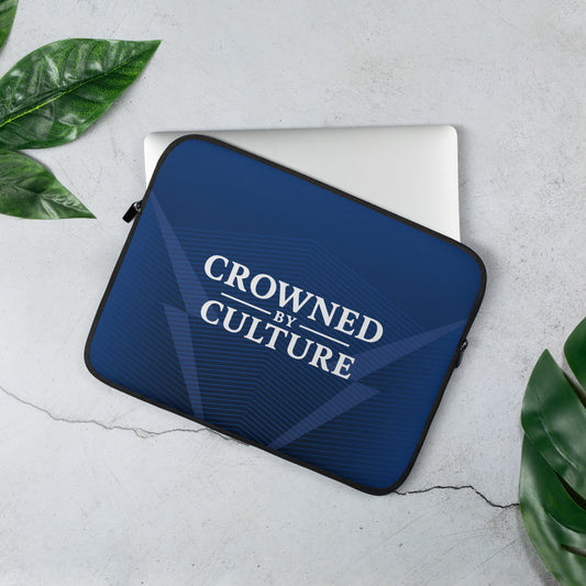 CBC laptop sleeve with geometric line pattern and Crowned By Culture text centered on the front.