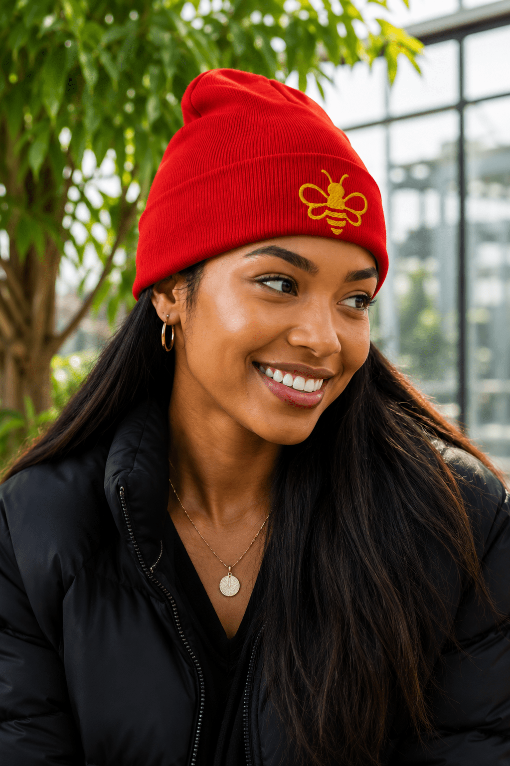 MHA Signature Beanie featuring the embroidered Melanin & Honey bee logo in a premium lifestyle setting.